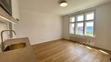 Zcela nový byt krásným výhledem v Korunní ulici, Vinohrady.