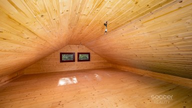 Prodej stavebního pozemku 1 300 m² se srubem, Stará Boleslav – Vestecká.